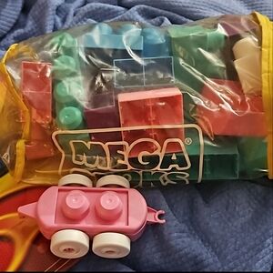 Rare Old Mega Bloks and vinyl carry case in hot wheels new gift bag car included